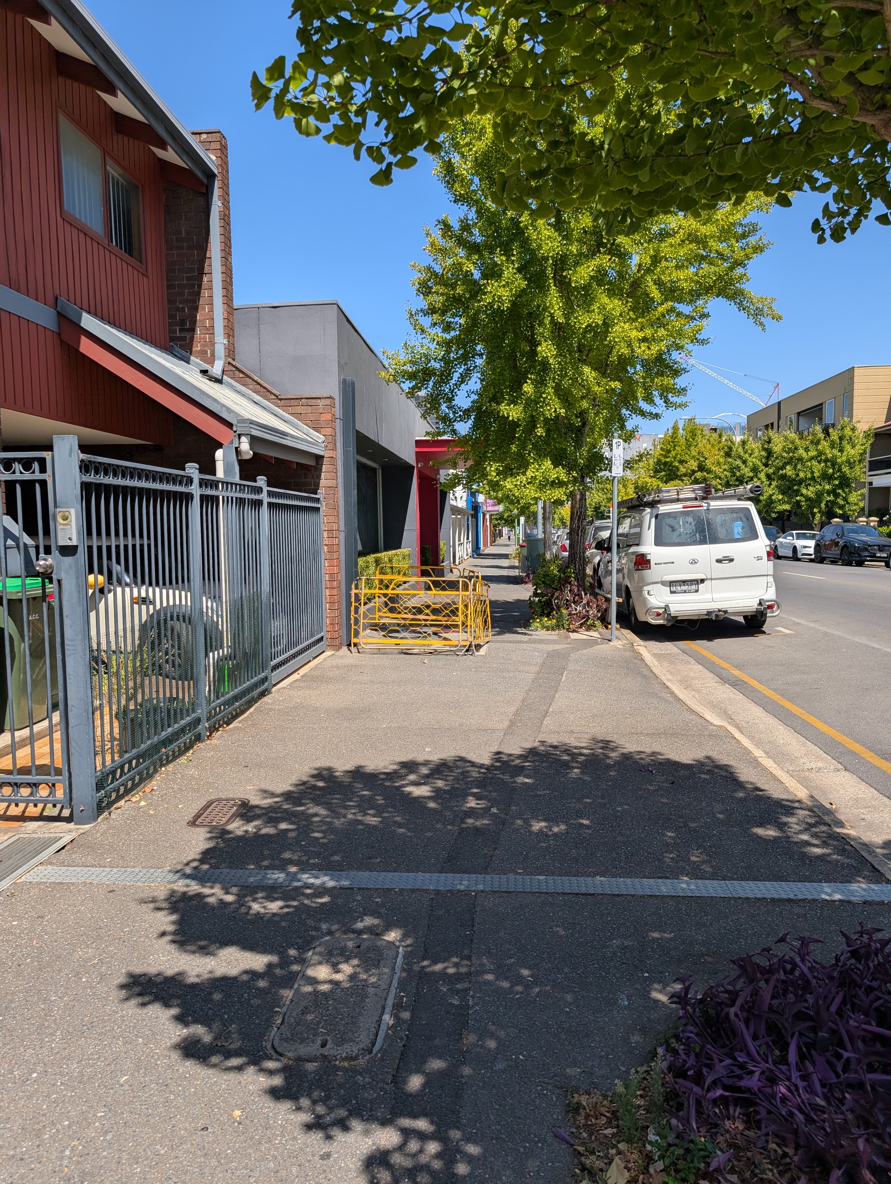 Telecommunications safety barrier photographed from a distance showing deployment context
